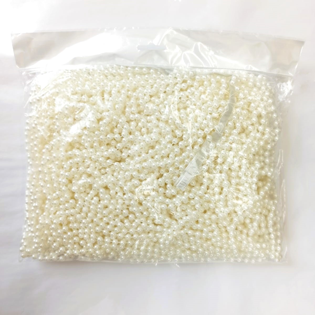 Жемчужная нить 6 мм х 75,5 м х 1 кг в интернет магазине картинка Жемчужная нить 6 мм х 75,5 м х 1 кг в интернет магазине